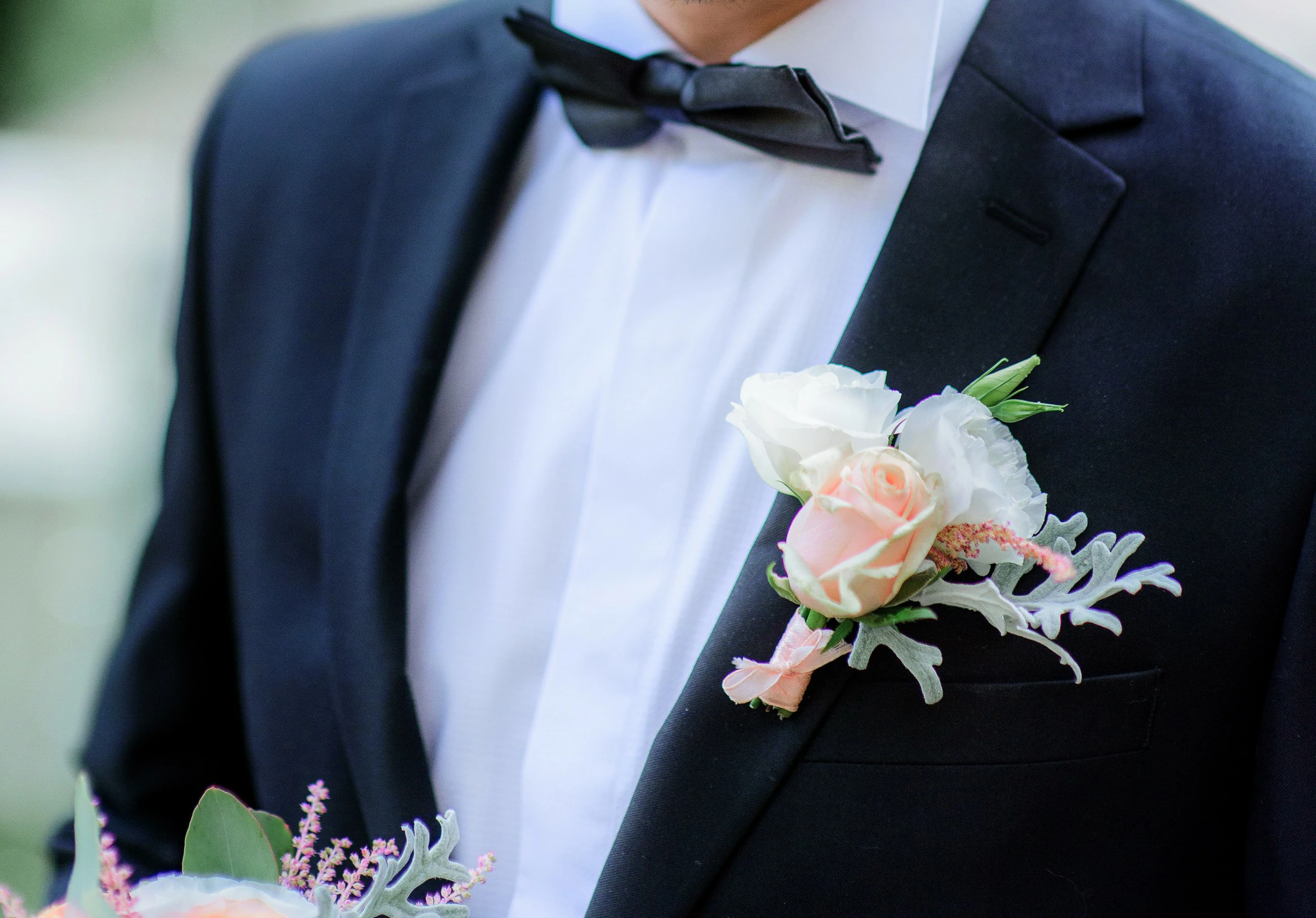 Services 2 handsome groom black suit white rose boutonniere